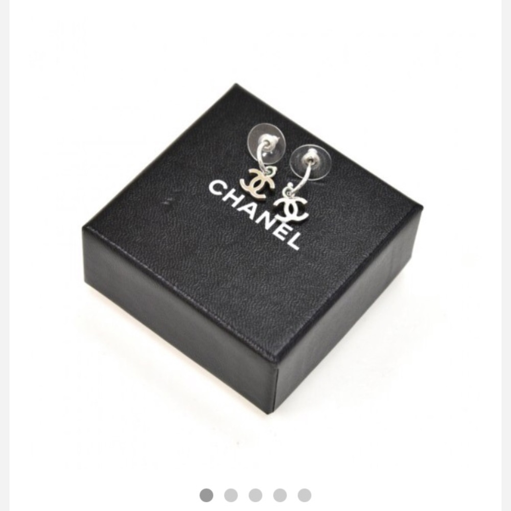 Chanel CC silver tone drop earrings.